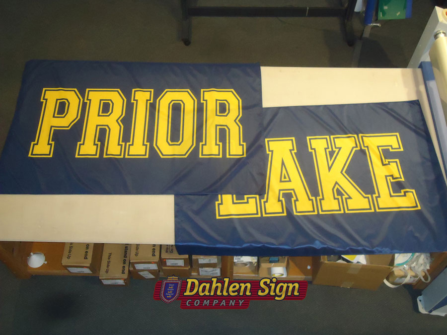 Prior Lake flags made by Dahlen Sign Company